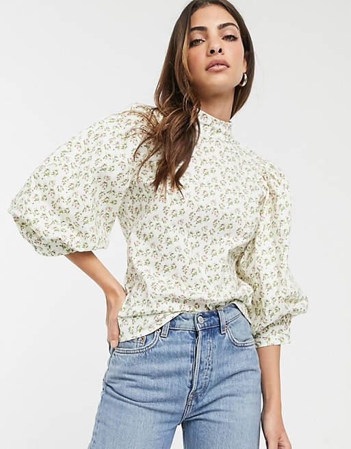 ASOS DESIGN high neck top with volume short sleeve in floral print