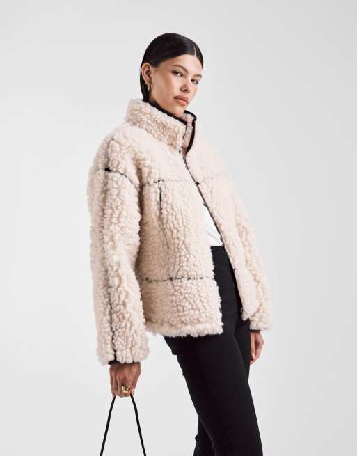 ASOS DESIGN high pile borg zip through in cream with pu trim detail