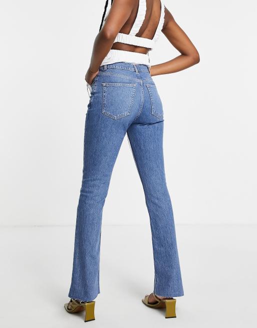 ASOS DESIGN high rise '70's' stretch flare jeans in midwash