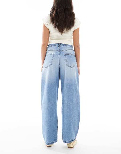 ASOS DESIGN high rise barrel jeans in mid blue with rips