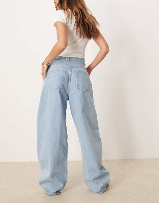 ASOS DESIGN high rise barrel jeans with rips in light wash