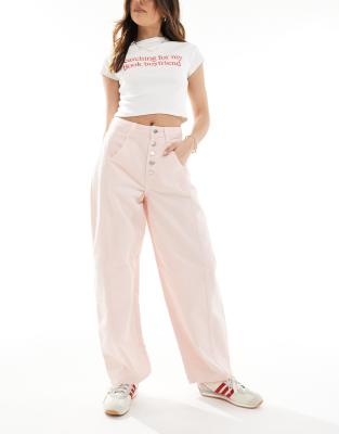 high rise barrel leg jeans in washed pink