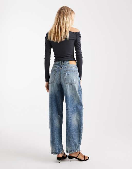 ASOS DESIGN high rise barrel leg jeans with rips in mid blue