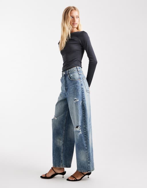 ASOS DESIGN high rise barrel leg jeans with rips in mid blue
