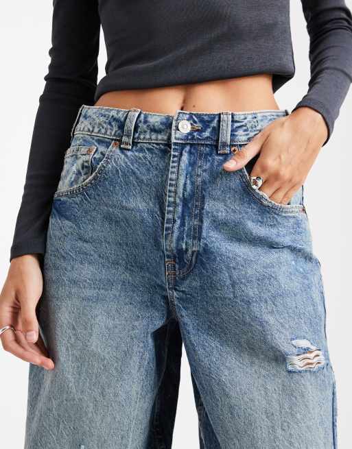 ASOS DESIGN high rise barrel leg jeans with rips in mid blue