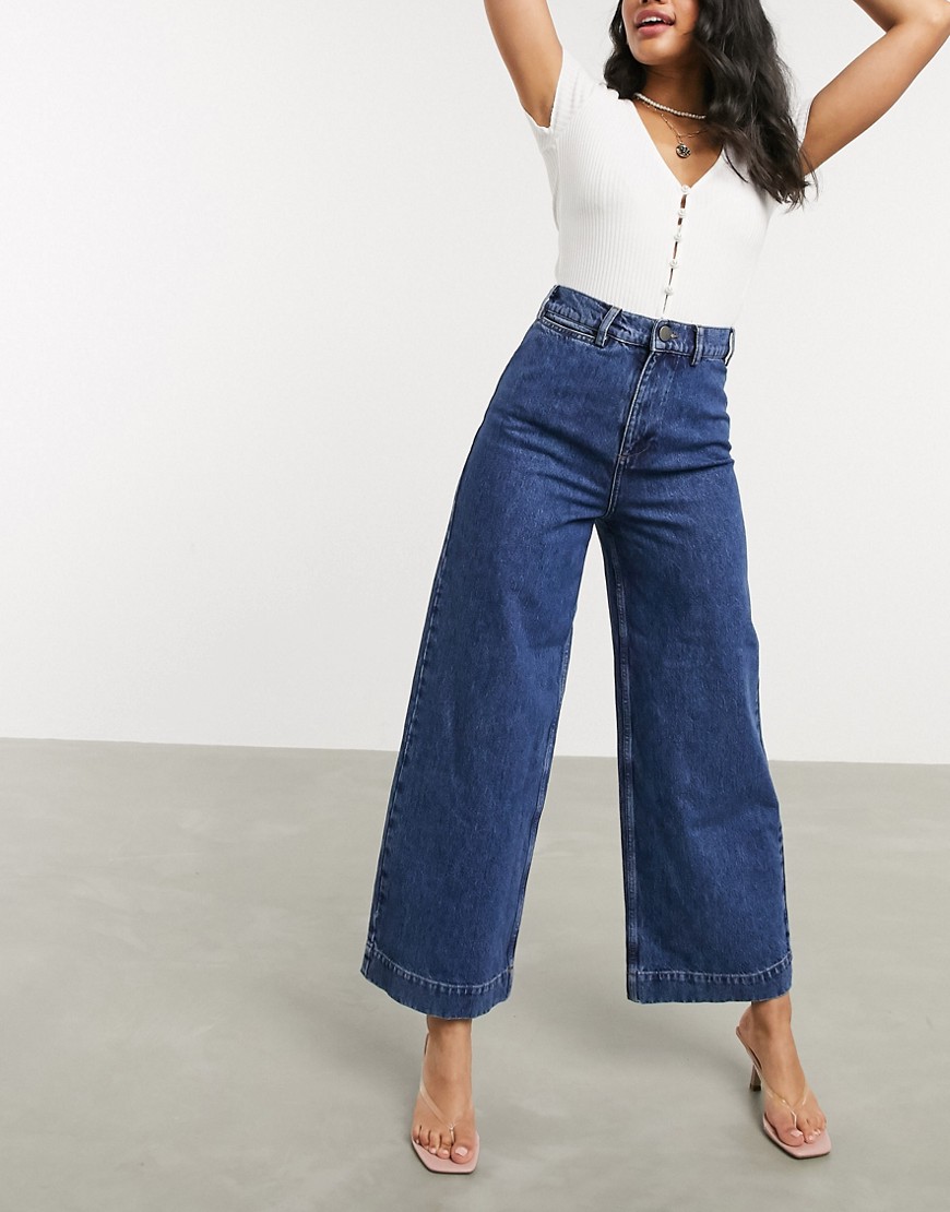 ASOS DESIGN High rise 'Easy' wide leg jeans in midwash blue