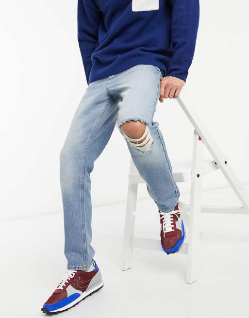 ASOS DESIGN high rise regular jeans in mid blue 90's wash with knee rip