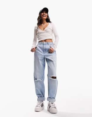 ASOS DESIGN high rise relaxed mom jean in light blue with knee rips