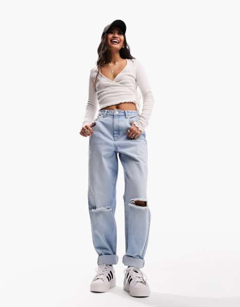 ASOS DESIGN high rise relaxed mom jeans in light blue with knee rips - view 1