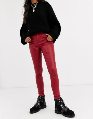 red coated skinny jeans