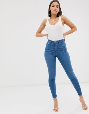 raw hem blue jeans