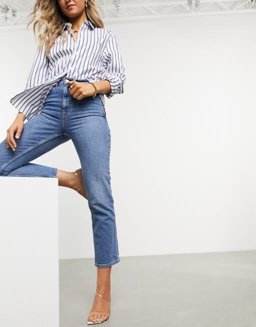 ASOS DESIGN high rise stretch slim straight leg jeans in midwash