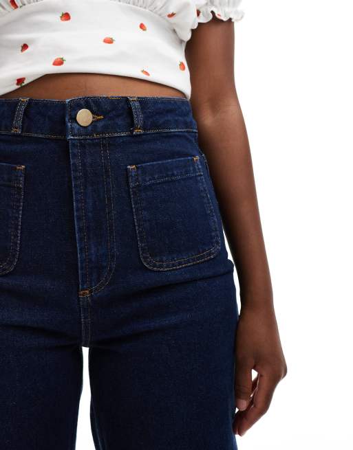 ASOS DESIGN clean wide leg jeans with front pockets in rinse