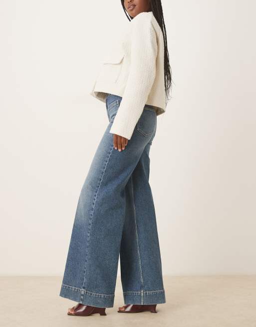 ASOS DESIGN high rise wide leg jeans with front pockets in vintage wash with crease front