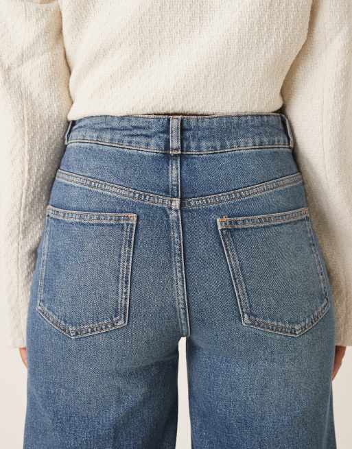 ASOS DESIGN high rise wide leg jeans with front pockets in vintage wash with crease front