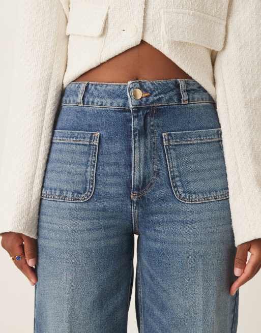ASOS DESIGN high rise wide leg jeans with front pockets in vintage wash with crease front