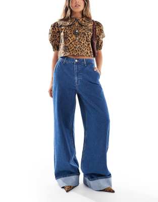 high rise wide leg jeans with turn up in mid blue