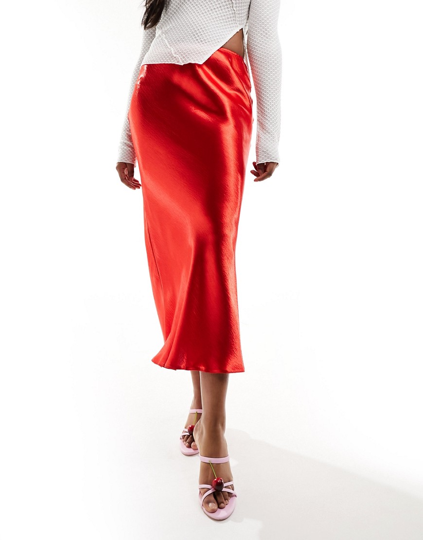 ASOS DESIGN high shine bias midi skirt in red