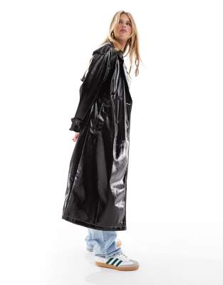 high shine leather look trench coat with contrast stitch in black