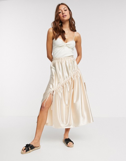 ASOS DESIGN high shine satin midi skirt with ruching detail in off white