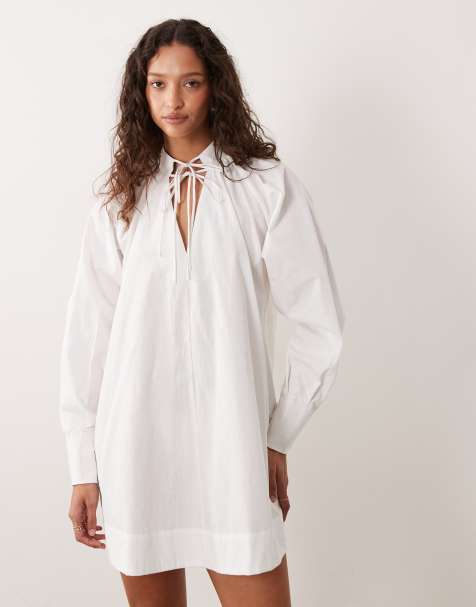 ASOS DESIGN high tie neck poplin mini dress with puff sleeves in white - view 1