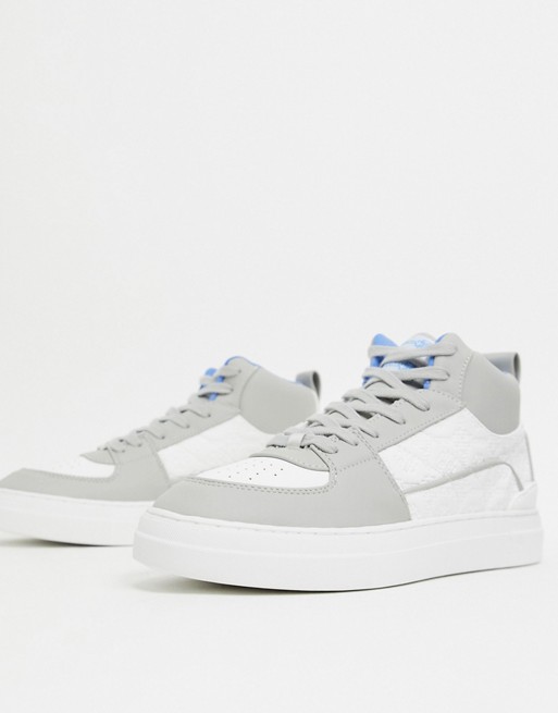 ASOS DESIGN high top trainers in grey and white emboss