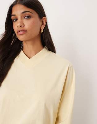 Asos Design High V Neck Detail Long Sleeve Tee In Gold