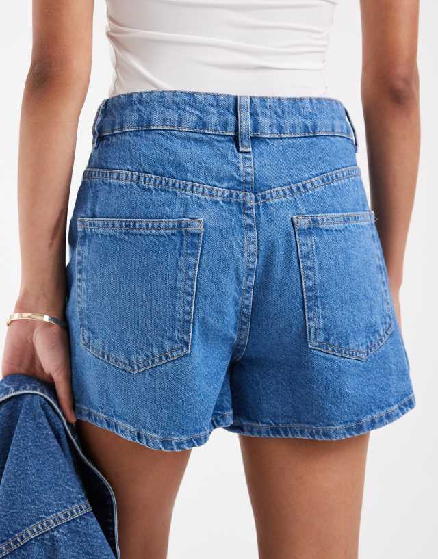 ASOS DESIGN high waist denim shorts in mid blue