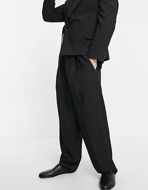 Men high waisted balloon suit trousers in black twill 