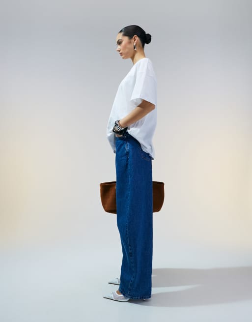 ASOS DESIGN high waisted barrel leg jeans in mid blue 
