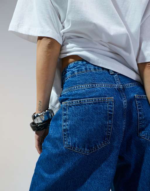 ASOS DESIGN high waisted barrel leg jeans in mid blue 
