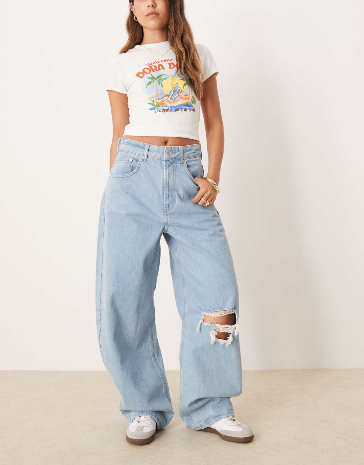 ASOS DESIGN high waisted barrel with rips in light wash