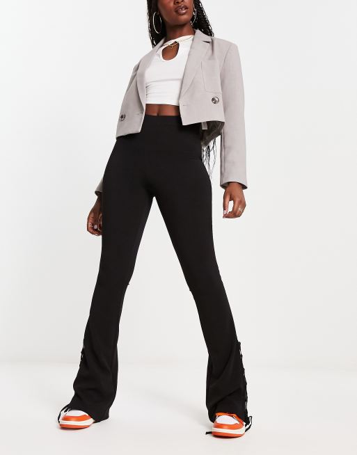 ASOS DESIGN high waisted lace up hem flare pants in black