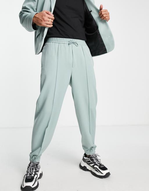 ASOS DESIGN flare suit trousers in pale green