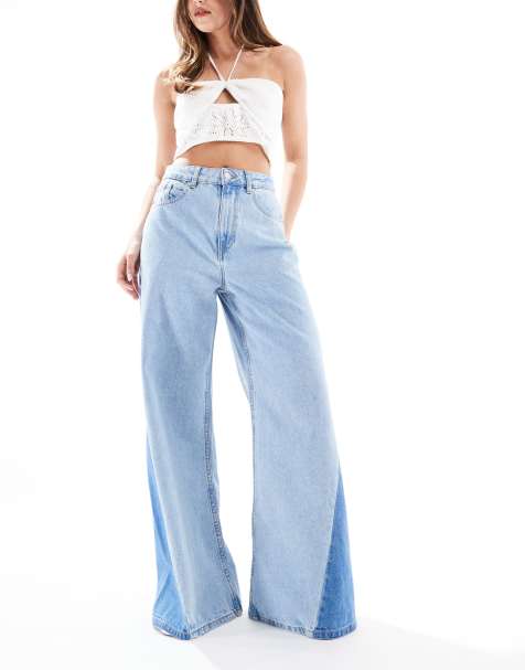 ASOS DESIGN high waisted wide leg jeans with patchwork twisted seam in lightwash - view 1