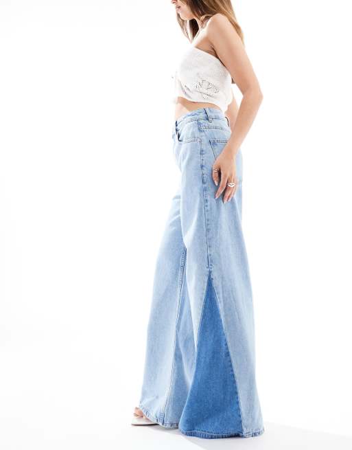 ASOS DESIGN high waisted wide leg jeans with patchwork twisted seam in lightwash