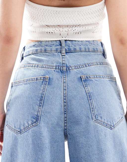 ASOS DESIGN high waisted wide leg jeans with patchwork twisted seam in lightwash, 3 of 5