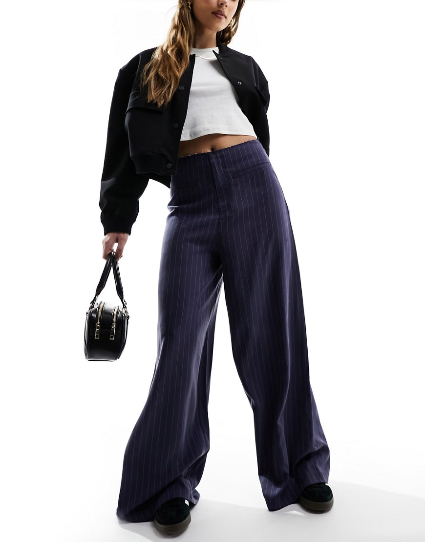 high waisted wide leg pants with raw edge detail in navy stripe