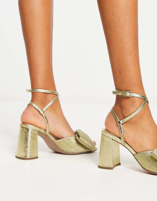 Gold store bow sandals