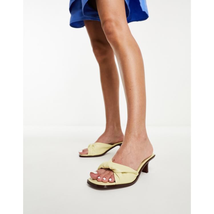 ASOS DESIGN Hither twist detail mid heeled mules in lemon | ASOS