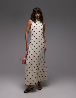 ASOS DESIGN - Hochgeschlossenes Neckholder-Maxikleid in Creme aus Chiffon mit Punktemuster-Bunt