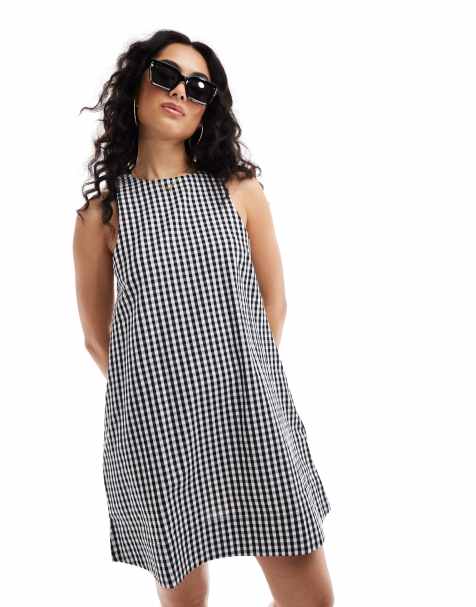 ASOS DESIGN – Hochgeschlossenes, schwingendes Mini-Sommerkleid in Schwarz-Weiß aus Leinen mit Vichy-Karos - view 1