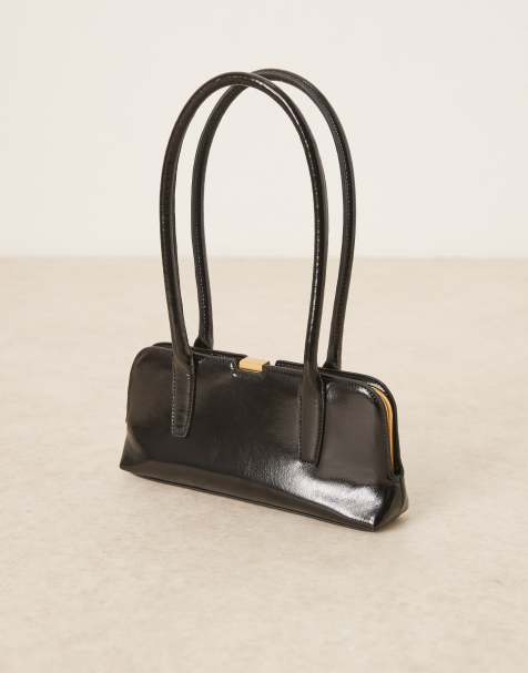 ASOS DESIGN – Hochglänzende Tasche mit länglichem Griff in Schwarz - view 1