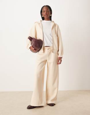 ASOS DESIGN - Hochwertige, schwere Jogginghose in Creme mit Ziernähten und weitem Bein, 500 g/m²-Keine Farbe