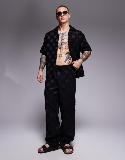 ASOS DESIGN – Hochwertige, weite Häkel-Hose in Schwarz, Kombiteil - view 1