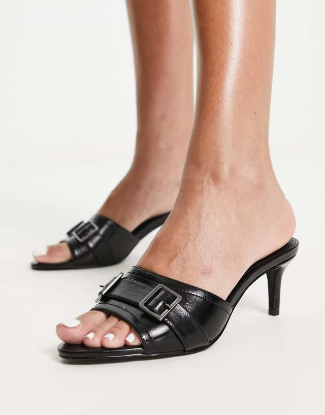 ASOS DESIGN Holbrook hardware detail mid heeled mules in black