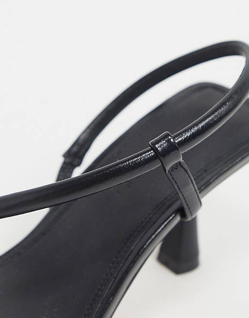 ASOS DESIGN Hold Me — Sorte højhælede sandaler med asymmetrisk | ASOS