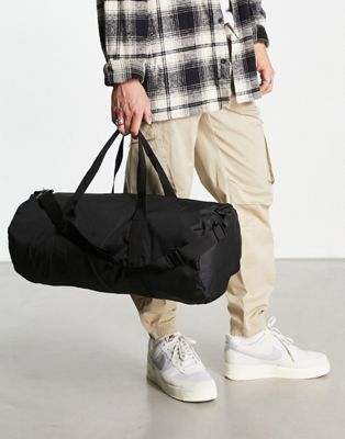 ASOS DESIGN holdall barrel bag in black nylon with contrast puller - BLACK - ASOS Price Checker