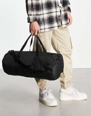 ASOS DESIGN holdall barrel bag in black nylon with contrast puller - BLACK - ASOS Price Checker