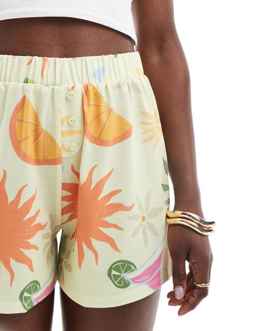 ASOS DESIGN holiday print boxer shorts in soft yellow, 5 of 5